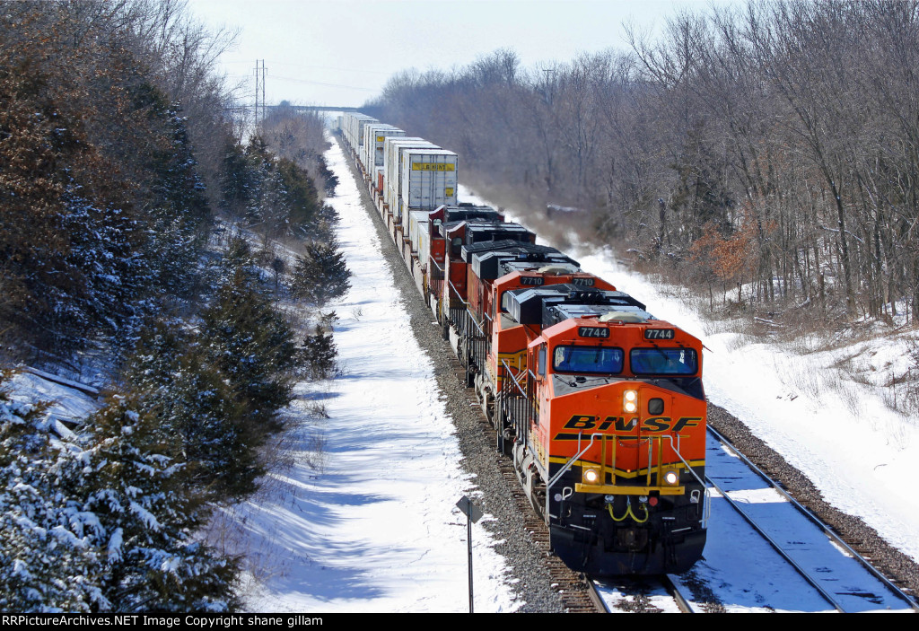 BNSF 7744 Slow's for Tk speed.